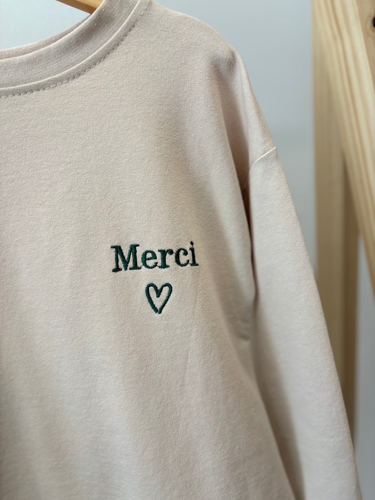 Pull Merci